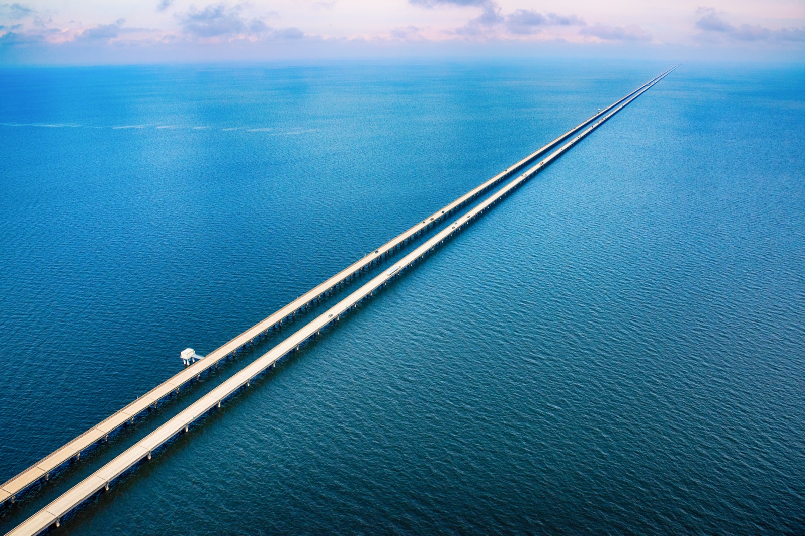 The Lake Pontchartrain Causeway running across open water to the horizon